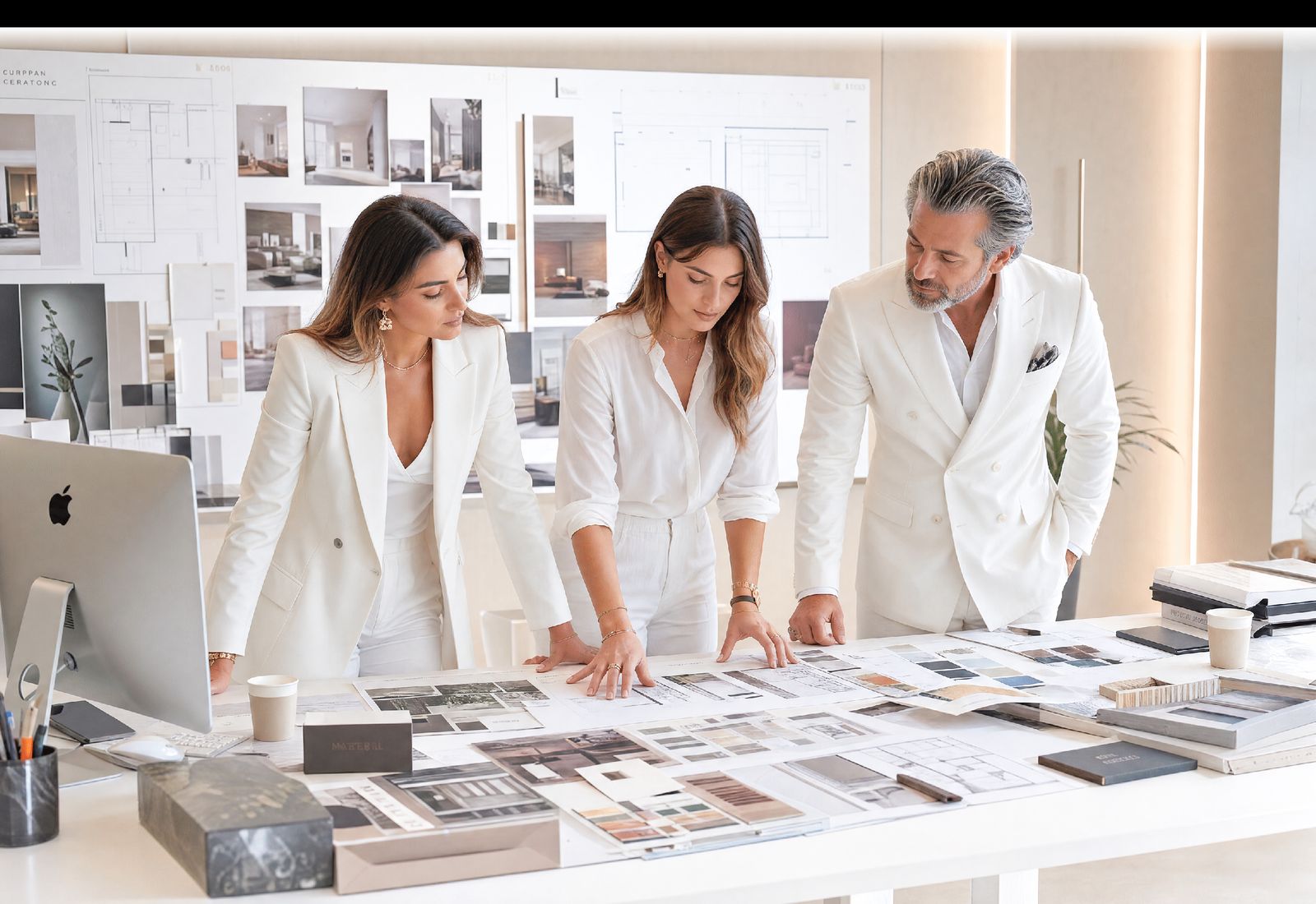 Buyer reviewing a printed catalogue at a trade show
